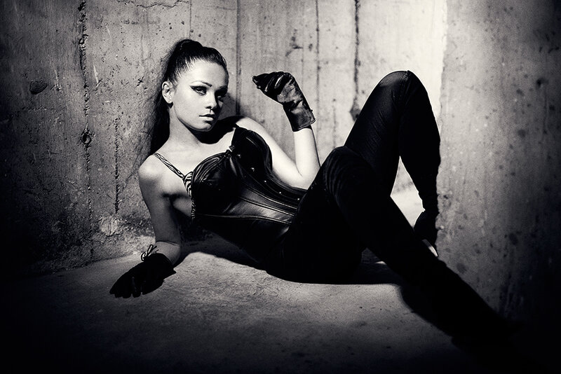 woman in leather corset posing