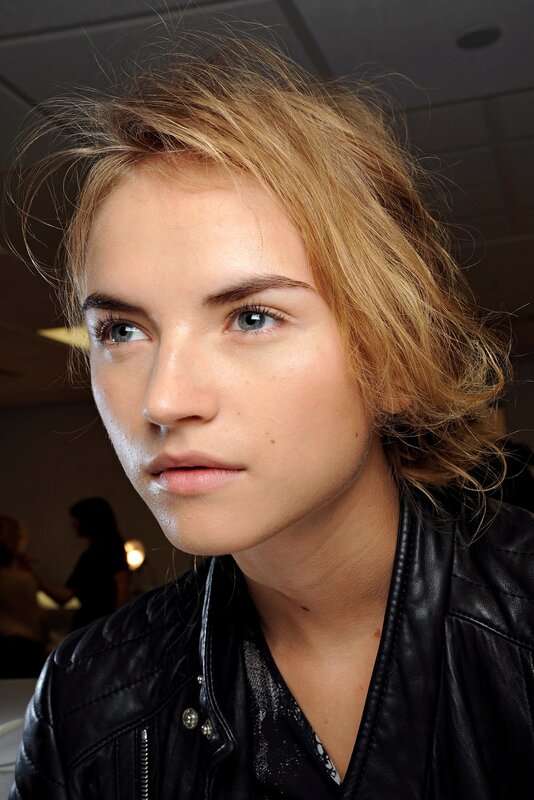 woman in leather jacket