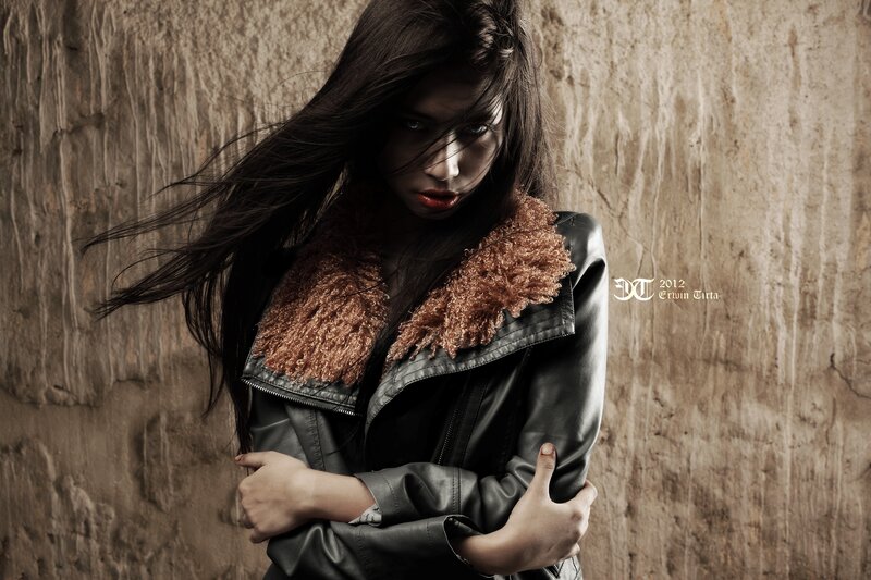 woman in leather jacket