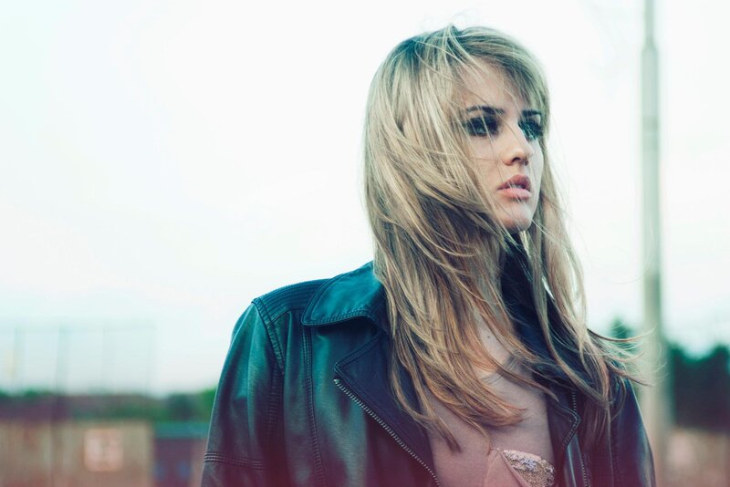woman in leather jacket