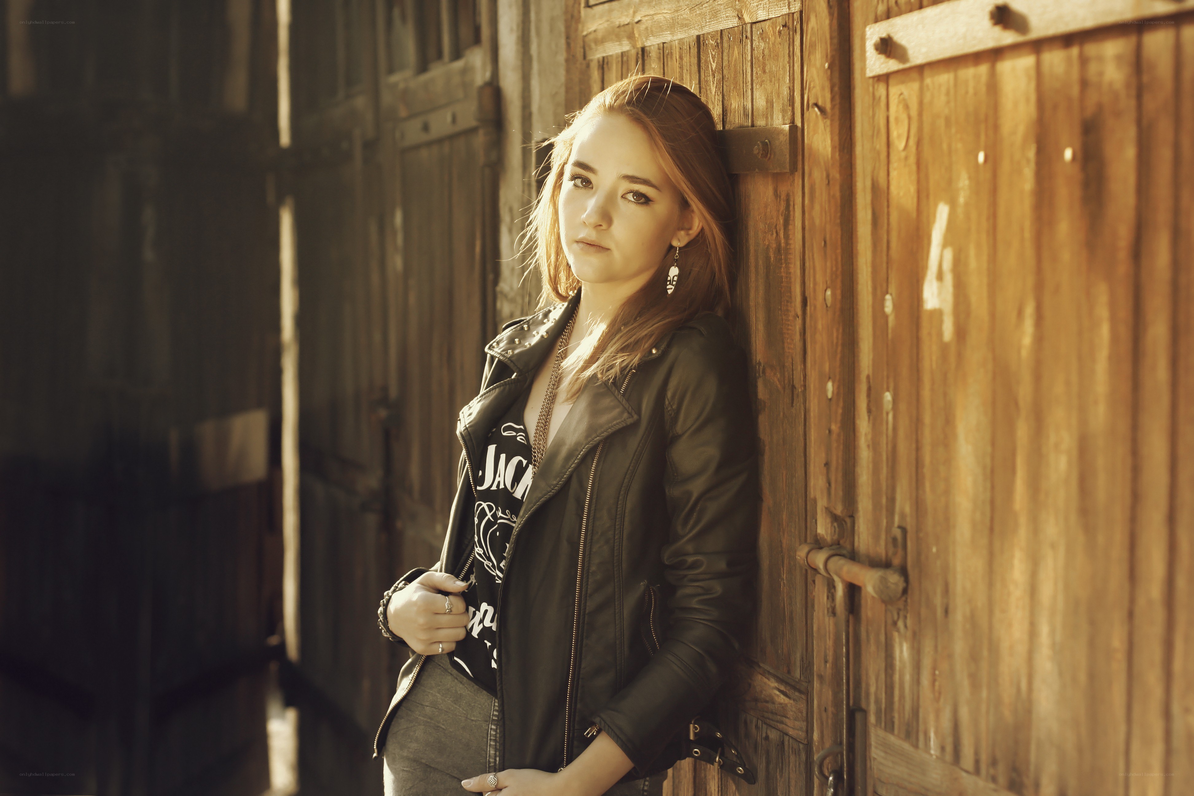 woman in leather jacket