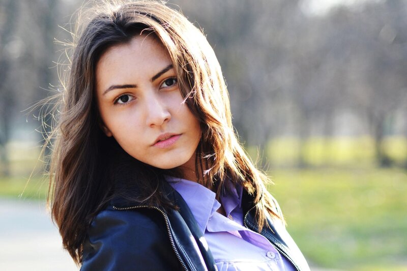 woman in leather jacket