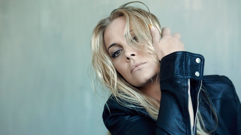 woman in leather jacket