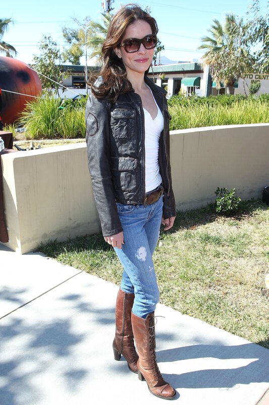 woman in leather jacket and boots