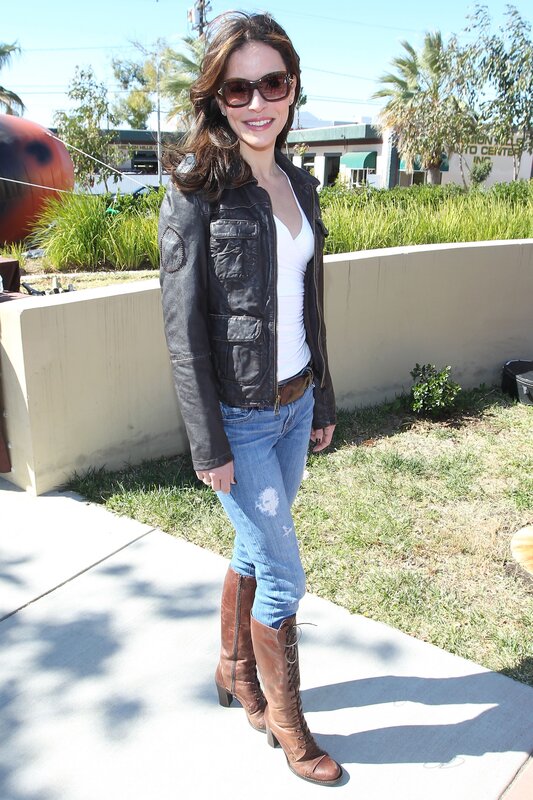 Woman in leather jacket and boots