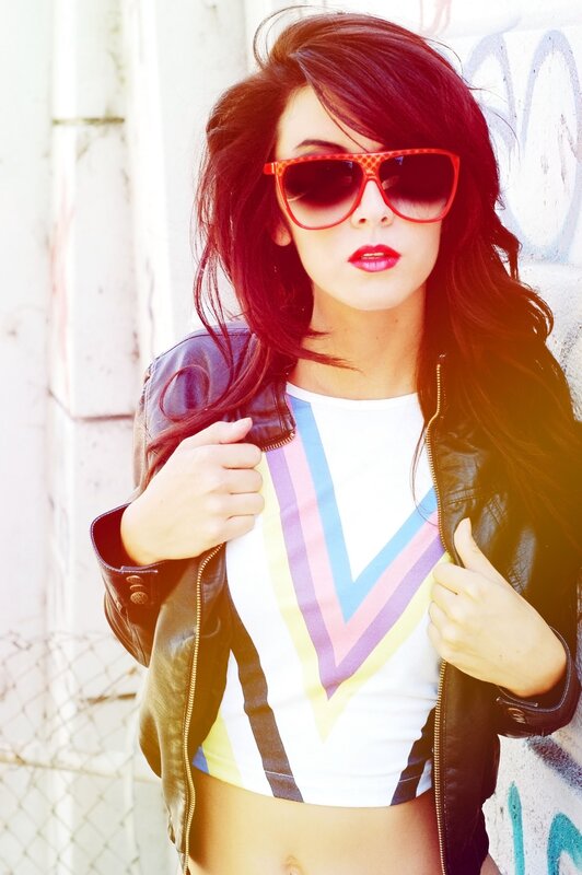 woman in leather jacket and sunglasses