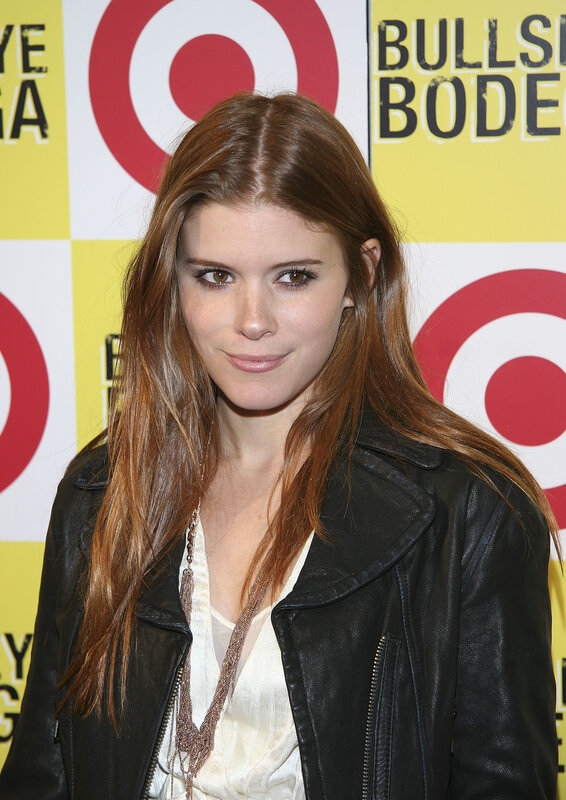 woman in leather jacket at event