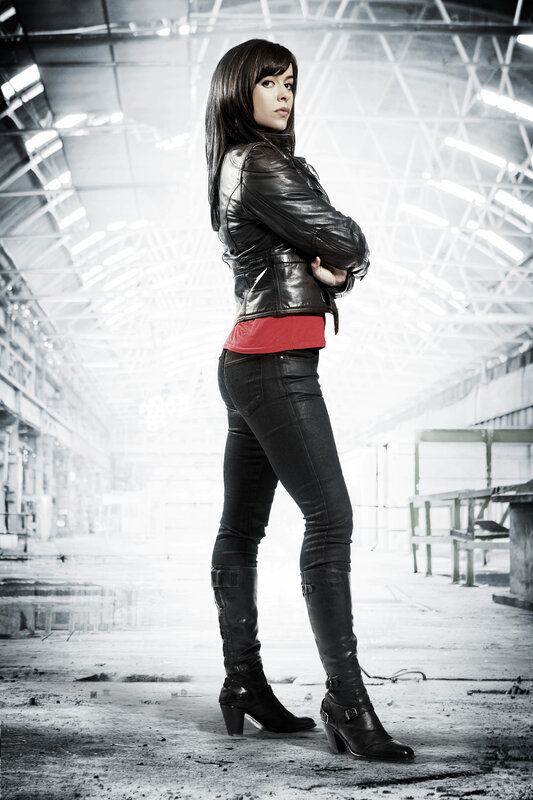 Woman in Leather Jacket — Black, Confident, Photograph, Leather Jacket, Jeans, Boots