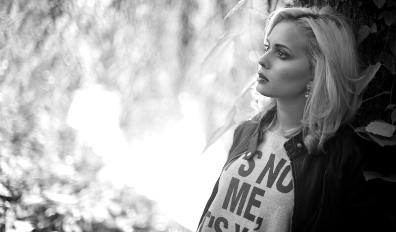 Woman in Leather Jacket — Black, Contemplative, Photograph, Tree