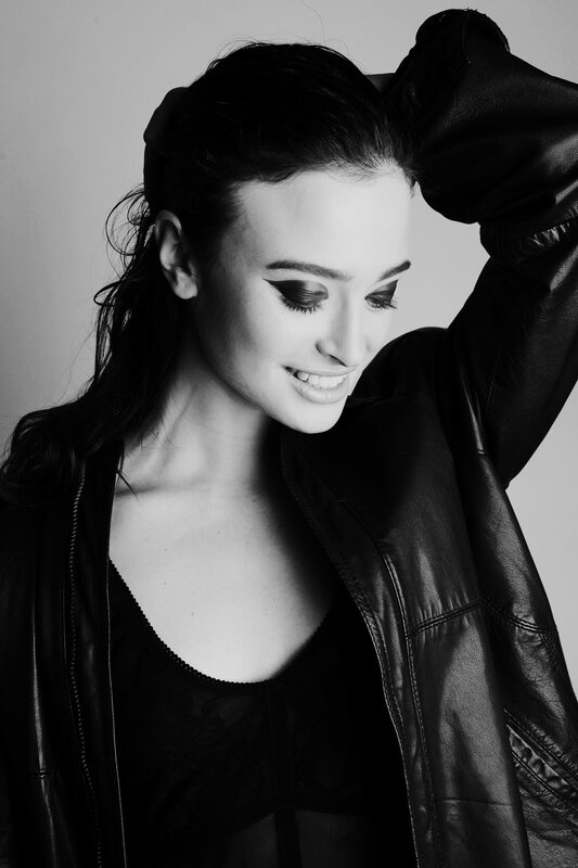 Woman in Leather Jacket — Black, Dramatic, Photograph, Leather Jacket, Makeup, Hair, White
