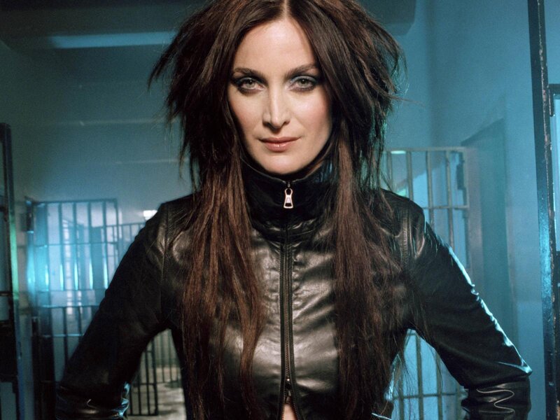 Woman in Leather Jacket — Black, Dramatic, Photograph, Leather Jacket, Prison Bars