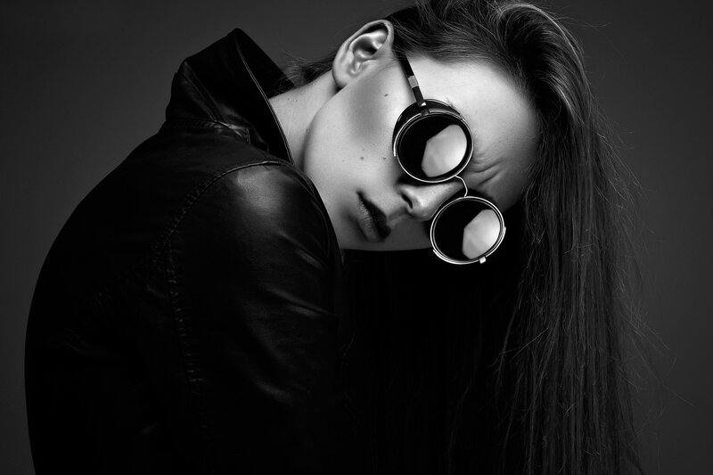 Woman in Leather Jacket — Black, Dramatic, Photograph, Sunglasses, Long Hair