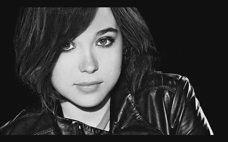 Woman in Leather Jacket — Black, Serious, Photograph, Leather Jacket, Black Background
