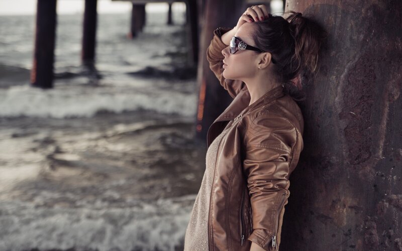 Woman in Leather Jacket — Brown, Contemplative