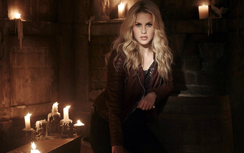 Woman in Leather Jacket — Brown, Dramatic, Night, Photograph, Candles, Stone Wall