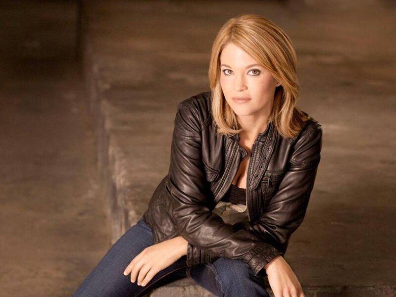 Woman in Leather Jacket — Brown, Serious