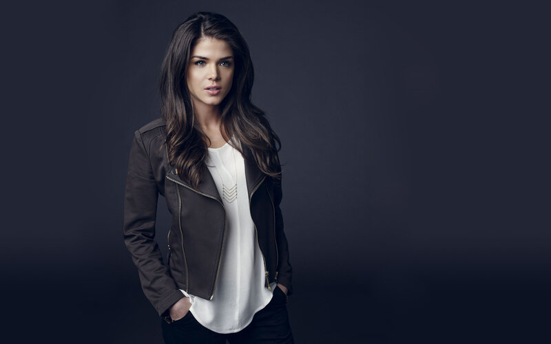 Woman in Leather Jacket — Gray, Serious