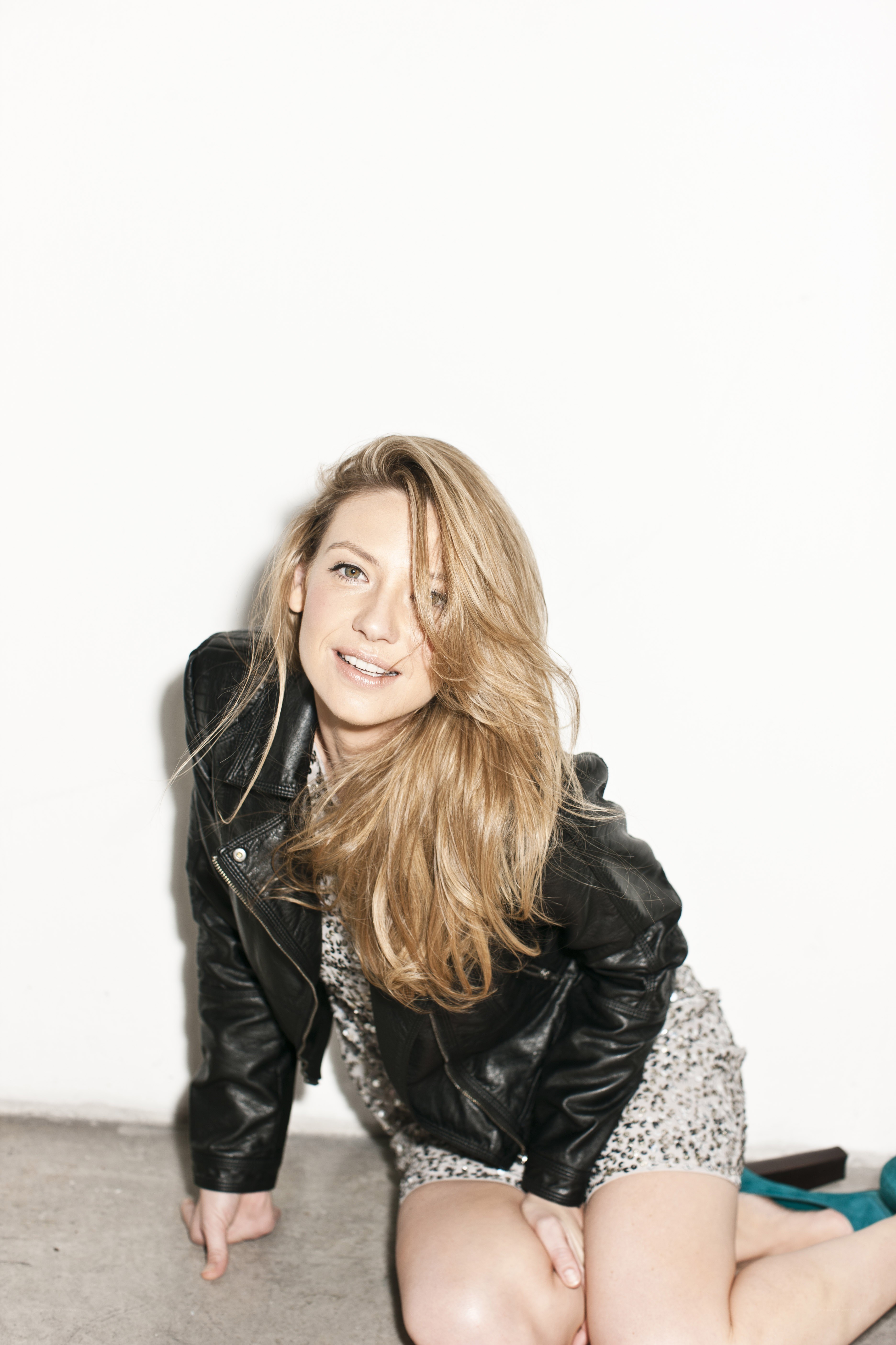 woman in leather jacket posing