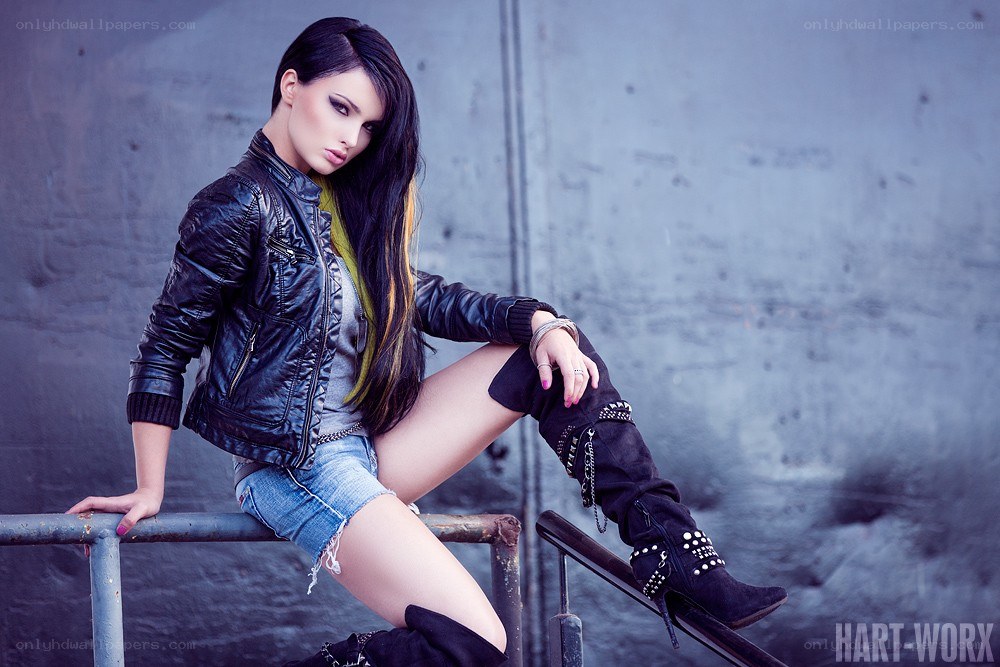woman in leather jacket posing