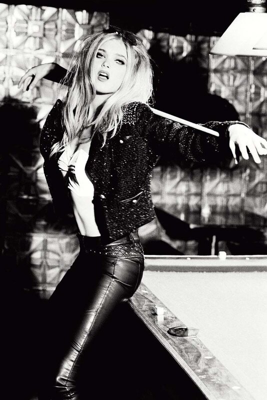 woman in leather jacket posing
