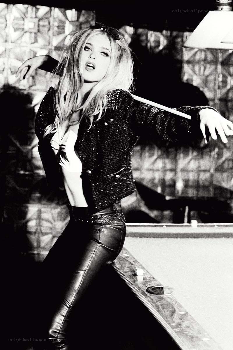 woman in leather jacket posing