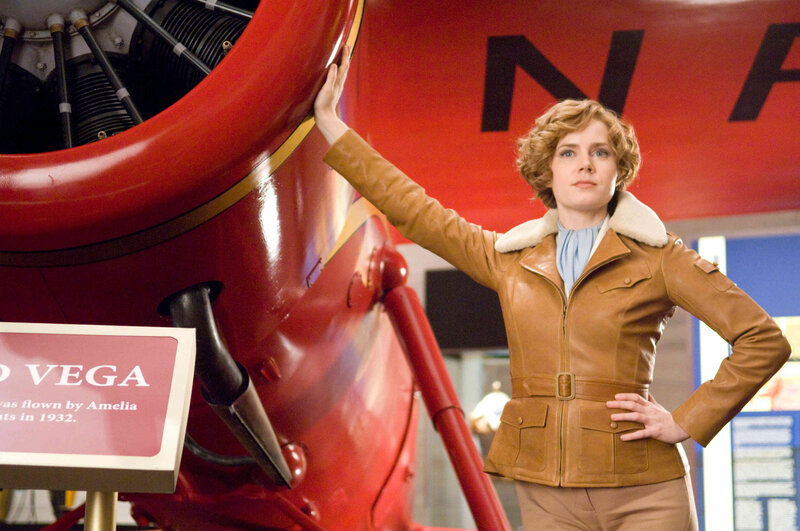 Woman in Leather Jacket — Red, Confident, Photograph, Airplane