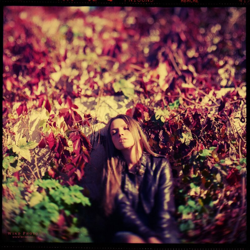 Woman in Leather Jacket — Red, Contemplative