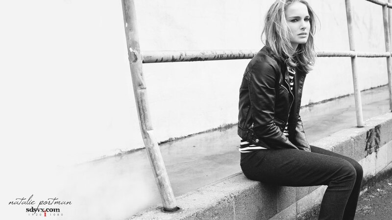woman in leather jacket sitting