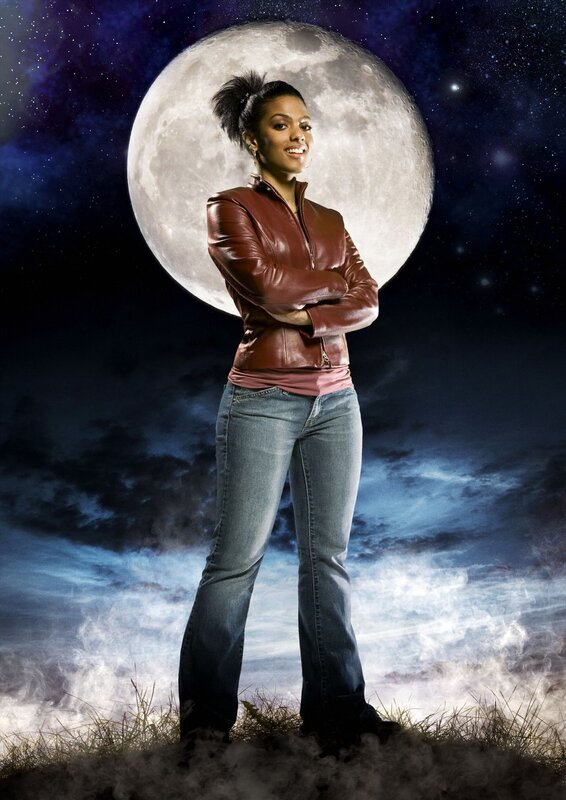 Woman in leather jacket under moon