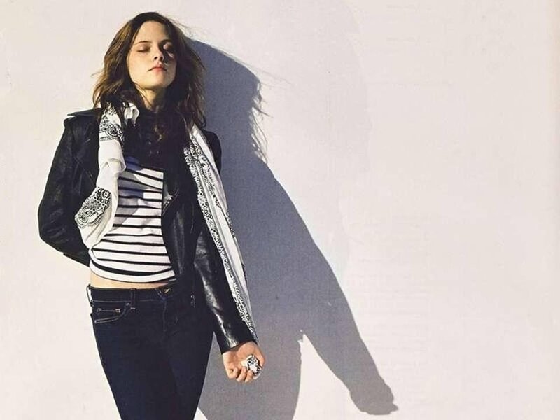 Woman in Leather Jacket — White, Dramatic