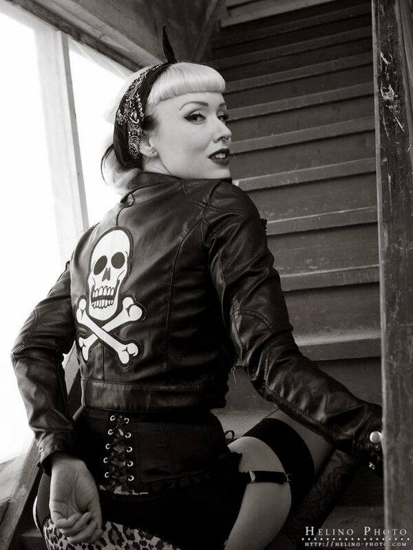 woman in leather jacket with skull