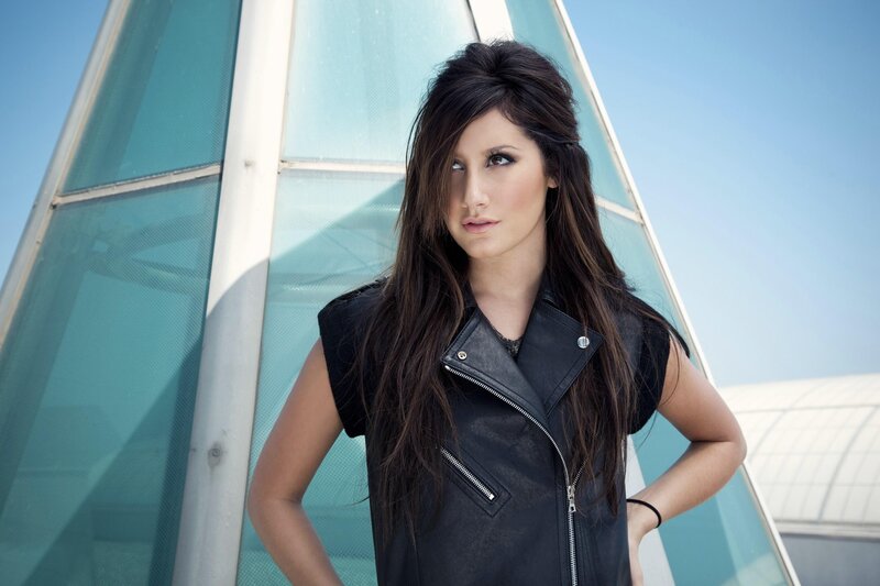 woman in leather vest