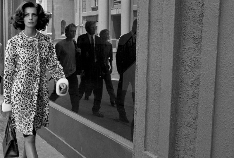 Woman in leopard coat walking