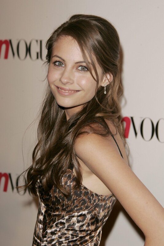 woman in leopard dress at event