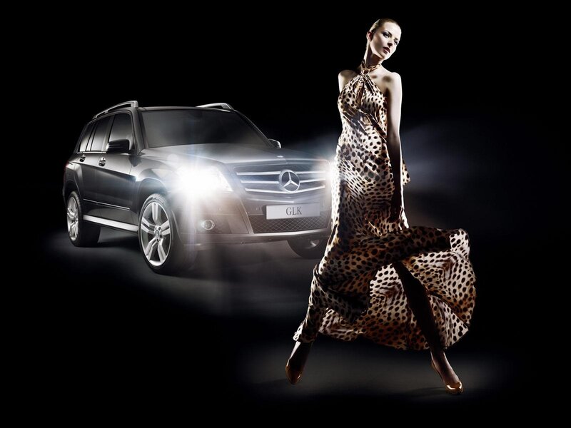 Woman in leopard dress with Mercedes GLK
