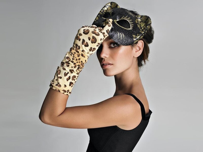 woman in leopard gloves and mask