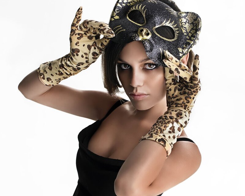 woman in leopard gloves and mask