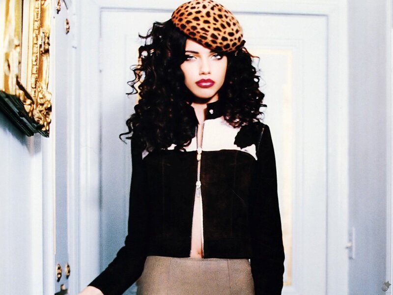 woman in leopard hat and jacket