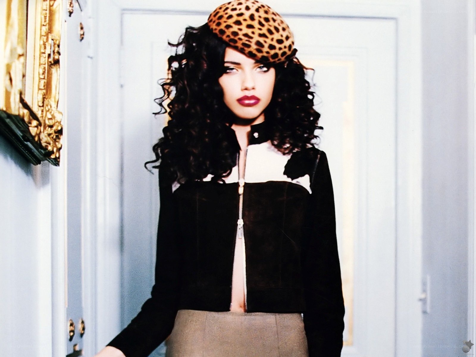 woman in leopard hat and jacket
