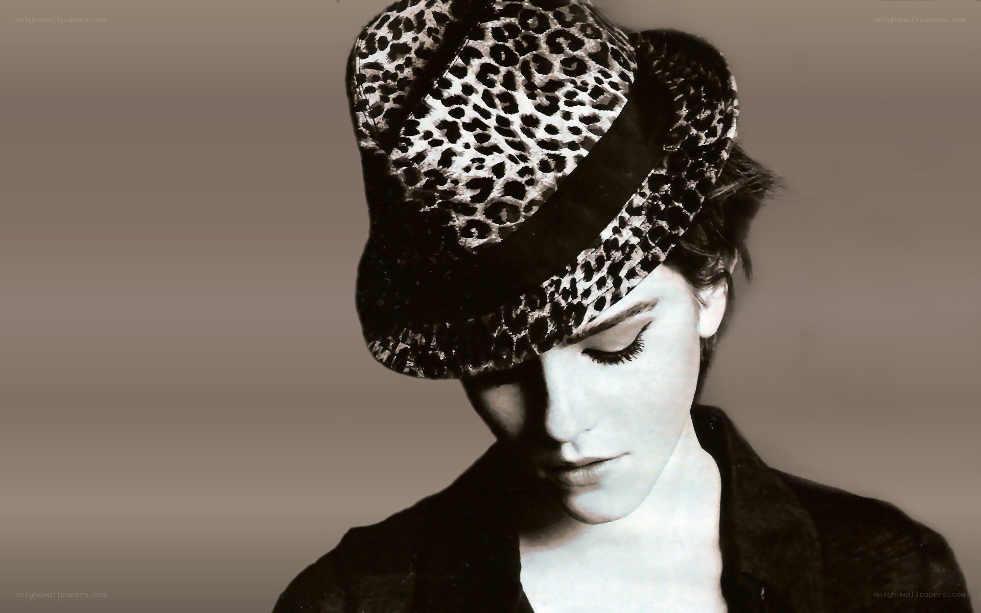 woman in leopard hat