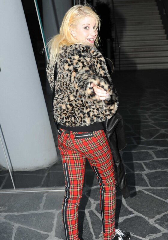 woman in leopard jacket and plaid pants