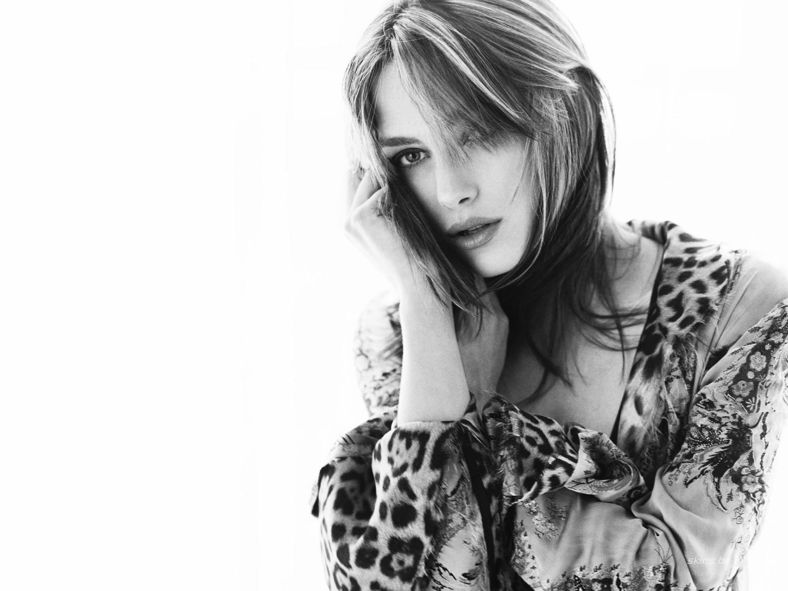 woman in leopard print blouse