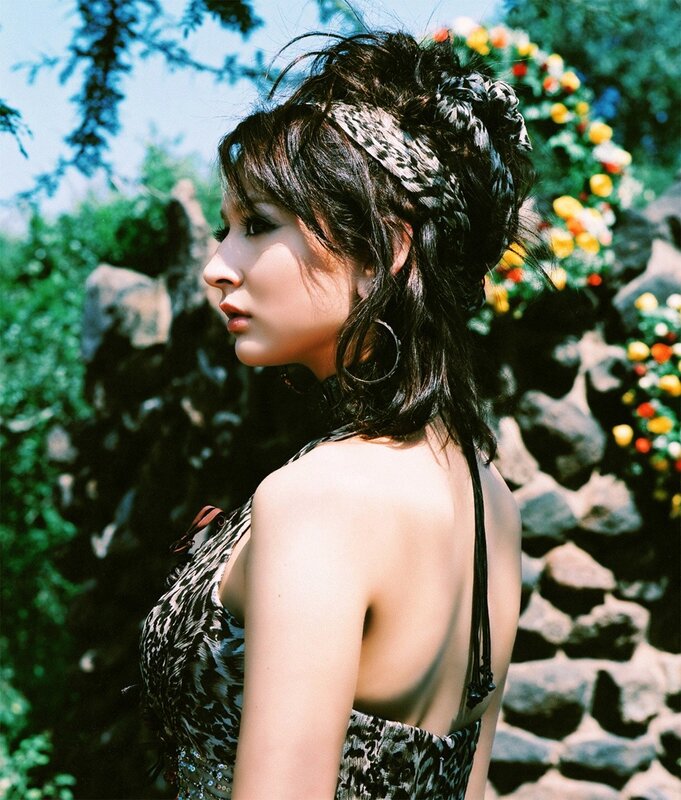 woman in leopard print dress