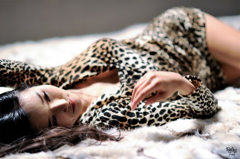 woman in leopard print dress