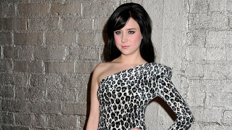 woman in leopard print dress