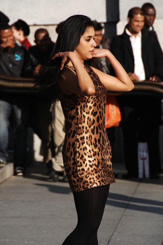 Woman in leopard print dress