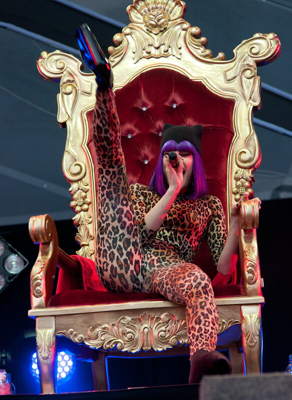 Woman in leopard print on throne