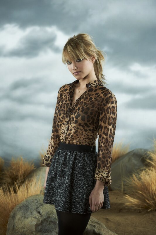 woman in leopard print shirt