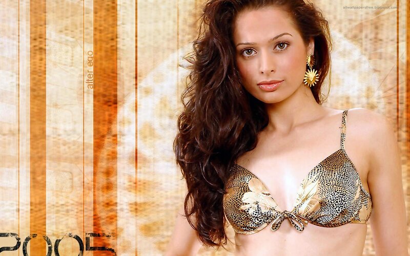 Woman in Leopard-print Top — Brown, Confident, Photograph, Earrings, Curly Hair
