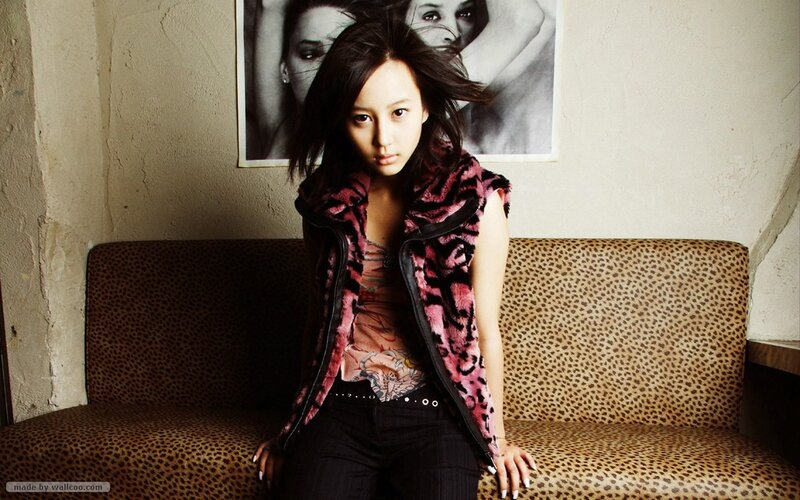 woman in leopard print vest